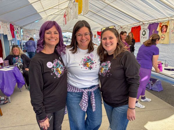 Purple Power Party raises awareness of domestic violence - The Beacon